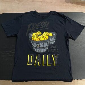 Nike Men's Black Tee with Yellow Graphic